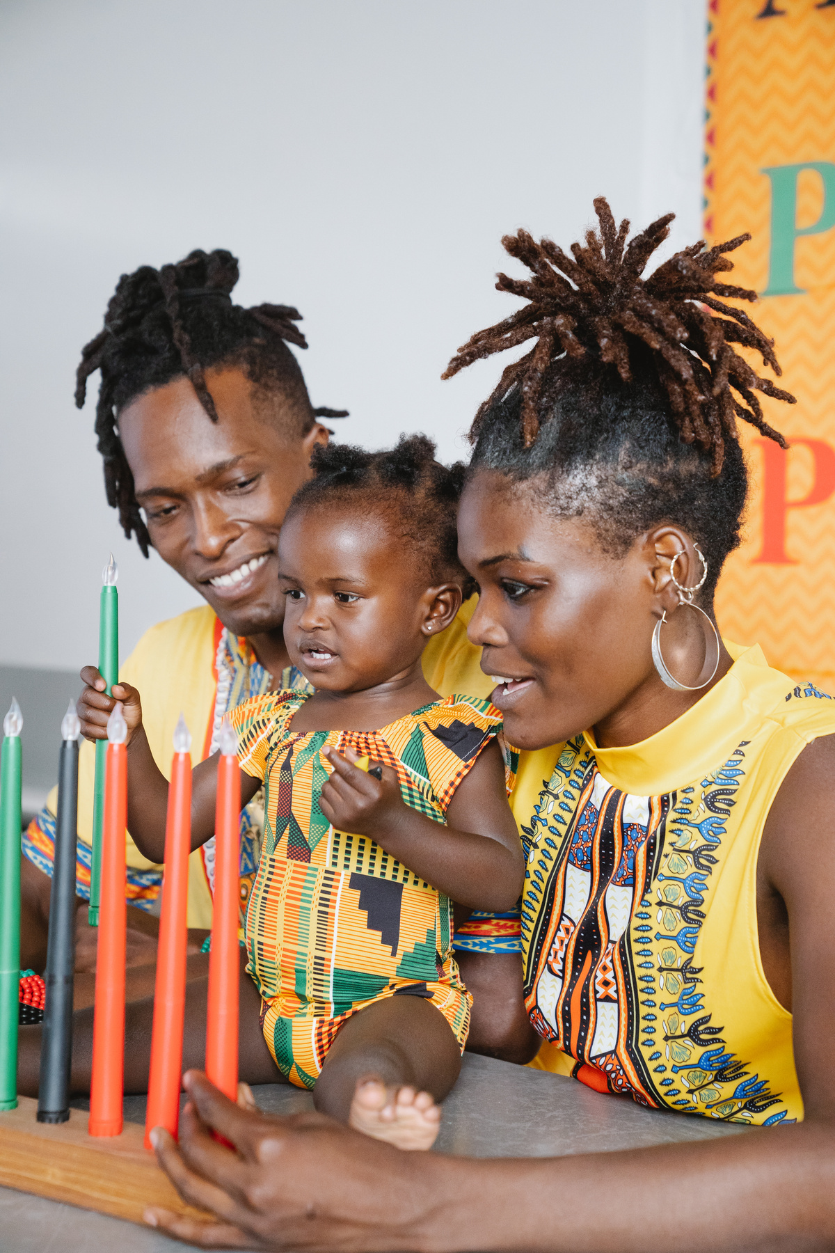 Black family with kinara candles